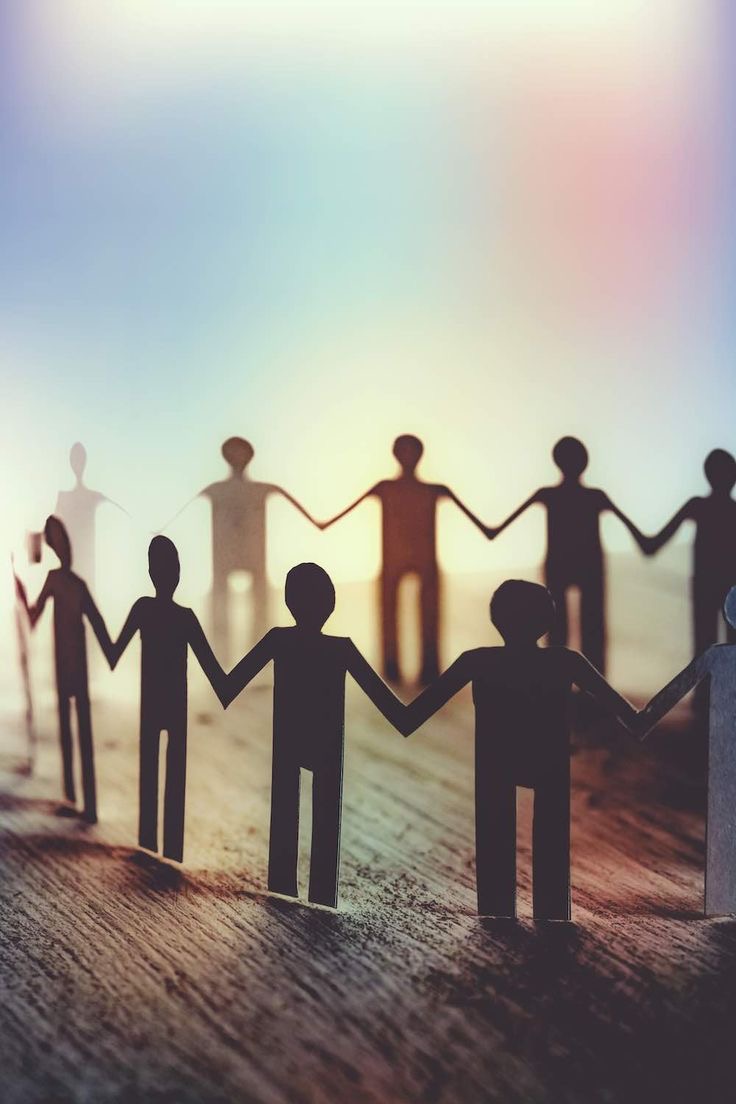 People joined hand in hand in a circle